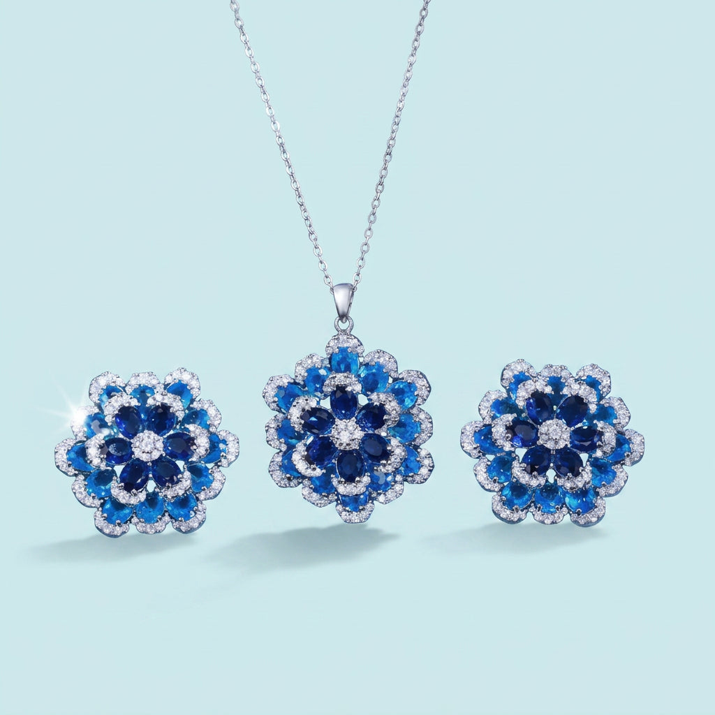 Blue CZ flower set on pale blue