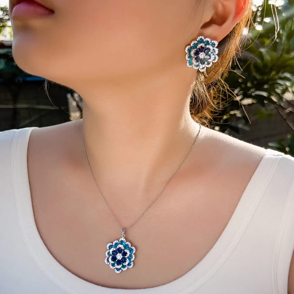 Blue CZ flower set worn by model