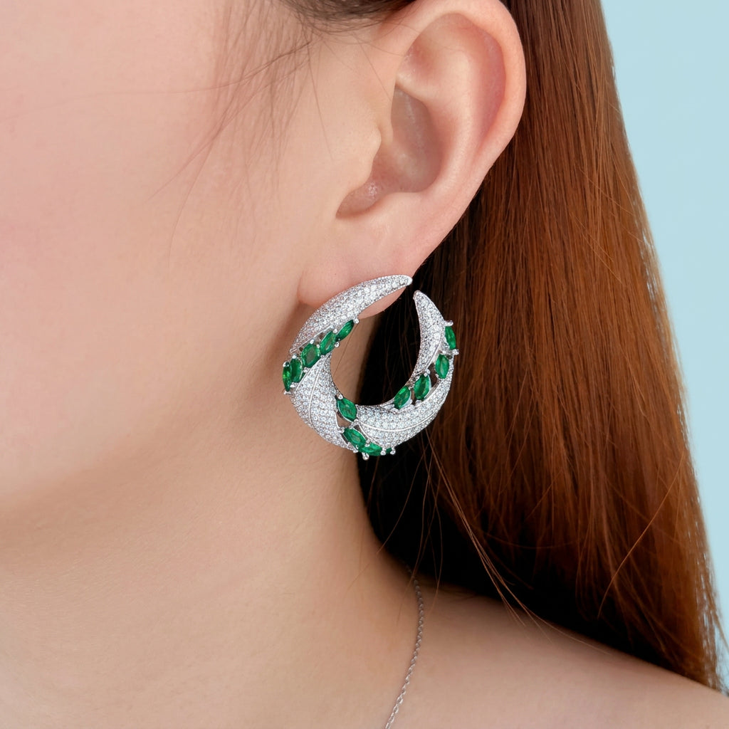 Green CZ Crescent Drop Earrings angled