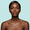 Heart pendant necklace shown on model