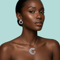 Model wearing marquise CZ leaf wreath necklace and earring set