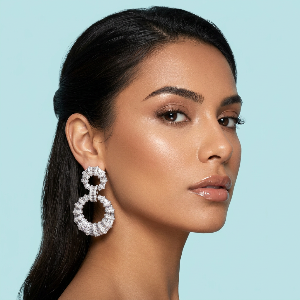 Model wearing white gold chunky double round CZ dangle earrings