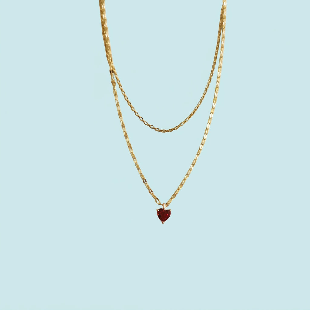 Gold layered necklace with ruby zirconia heart pendant