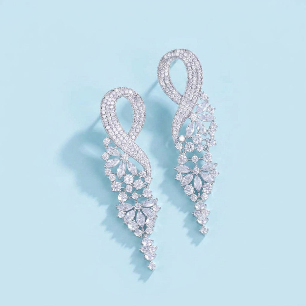 Sparkling CZ Pave Long Leaf Earrings flatlay