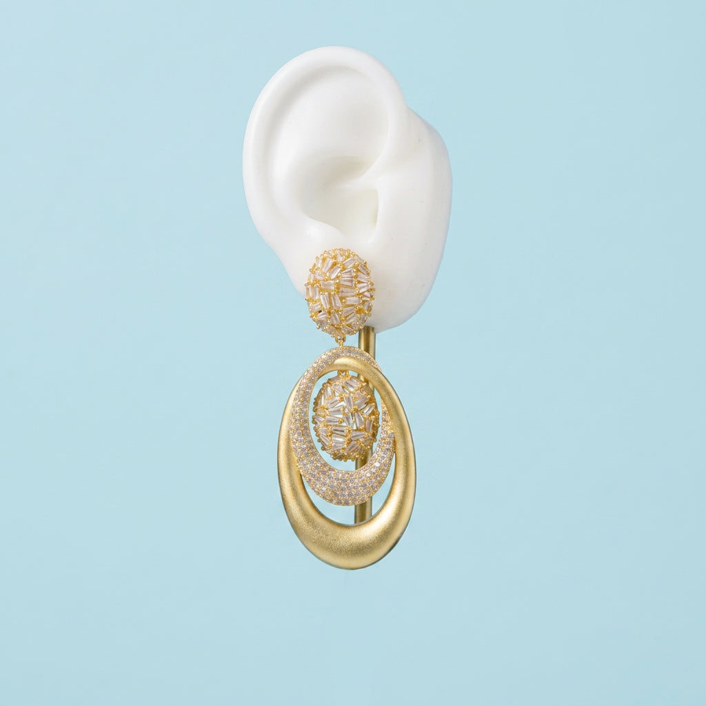 Sandblast dangle earring on ear