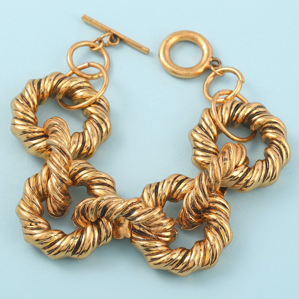 Gold twist chain bracelet with toggle clasp
