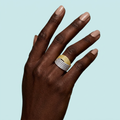 African model wearing two tone twist line statement ring